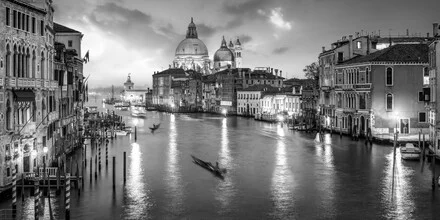 Panorama of Venice: calm waterways and romantic gondolas under the evening sky