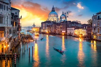 Cityscape featuring the Grand Canal in Venice, soft sunset glow.