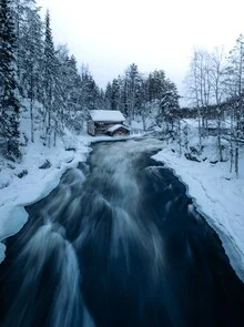 Photo art by André Alexander: gentle river flow in Finnish winter landscape