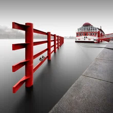 Photo of the Vltava River in Prague with calm water surface and soft lighting.