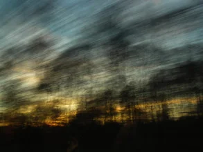 Photo art by Christiane Wilke: moving sunset with blurred trees