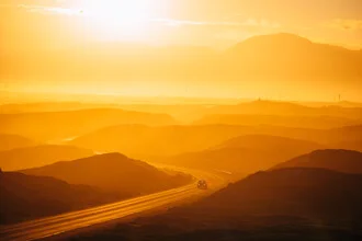 Fotokunst von André Alexander: sanfte Farben und Schichten eines Sonnenuntergangs