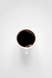Black and white photo art: a coffee cup on a minimalist background.