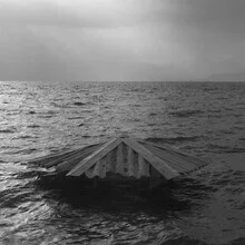 Photo art by Tas Careaga: black-and-white image of a flooded beach in Guatemala