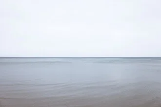 Photo by Roman Becker: serene beach landscape with gentle waves.