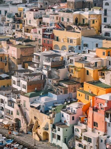 Photo art by Luca Talarico: Fishermen at work in the colorful streets of Procida.