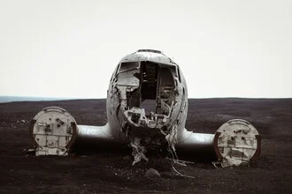 Photo art by Roman Becker: airplane above calm water in Iceland