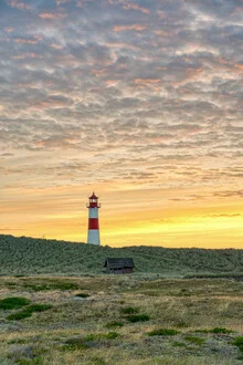 Photo art: Lighthouse List-East on Sylt at sunrise by the sea