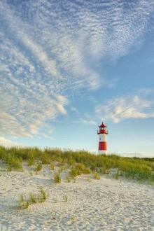 Photo art by Michael Valjak: Lighthouse by the North Sea under a clear evening sky