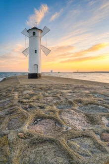 Photo art by Michael Valjak: windmill beacon in Swinoujscie at sunset.