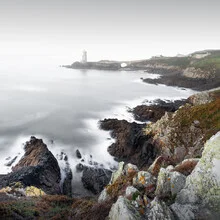 Wall art by Ronny Behnert: Lighthouse in Brittany surrounded by fog and calm waters