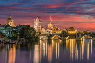 Photo art by Michael Valjak: night cityscape of Prague with illuminated buildings