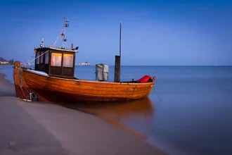 Photo art by Martin Wasilewski: calm blue hour on the Baltic beach with gentle waves