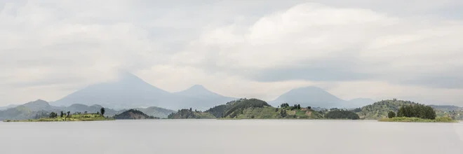 Panoramic view of the Virunga Mountains over Lake Mutanda in Uganda