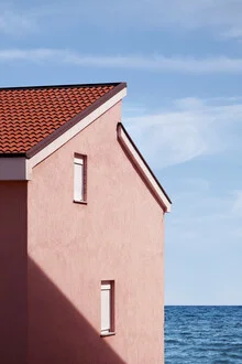 Photo art by Rupert Höller: minimalist pink house by the blue sea