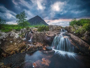 Photo art by Jean Claude Castor: waterfall in the Scottish Highlands with mountains and clouds.