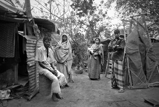Wall art by Jakob Berr: Fishermen family in front of huts in Bangladesh