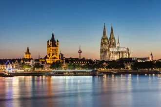 Photo art by Michael Valjak: Cologne skyline at dusk by the Rhine river