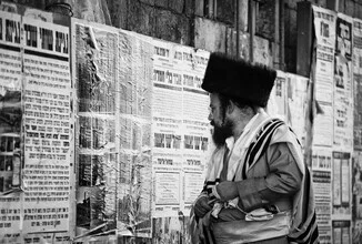 Photo art by Victoria Knobloch: man reading a newspaper in a cozy room