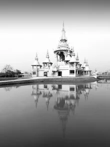 Photo art by Christian Janik: peaceful temple in Thailand featuring Buddha and reflection.