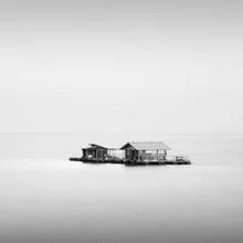 Photo art by Christian Janik: fishing hut by the water with soft colors