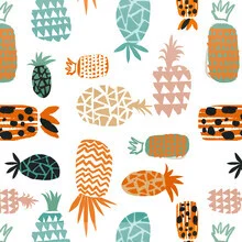 Wall art featuring colorful pineapples in a playful, tropical pattern.