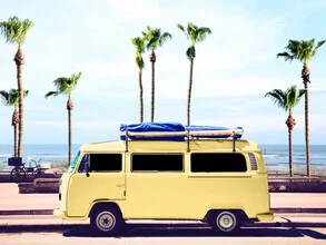 Wall art of a yellow van surrounded by palm trees and summer vibes