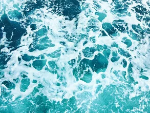 Photo art by Gal Pittel: waves gently crashing against the shore