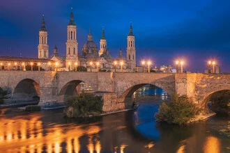 Photo art by Jean Claude Castor: Basilica del Pilar in Zaragoza at night with gentle lighting.