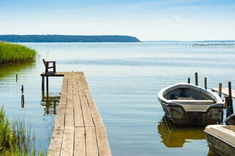 Photo art by Martin Wasilewski: tranquil lakeside scene at the Baltic Sea with a jetty