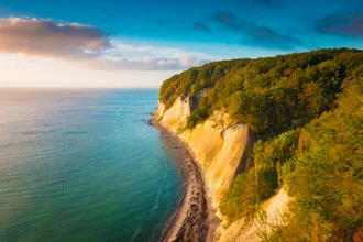 Sunrise at the chalk coast: soft colors and calm mood by the sea.