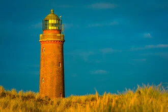 Photo art by Martin Wasilewski: lighthouse at sunset by the Baltic Sea