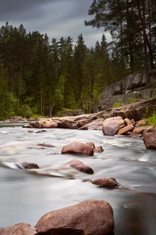 Photo art by Norbert Gräf: Bratfallet river with clouds and rocks in Sweden