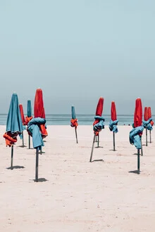 Photo art by Eva Stadler: Deauville's iconic blue and red colors at the beach