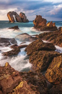 Photo art by Jean Claude Castor: coastal landscape with rocks at sunset in Spain