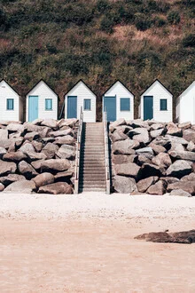 Beach huts at Plage de la Potinière in soft colors and a calm atmosphere.
