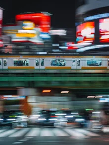 Photo art by Luca Talarico: train journey through a bustling street view in Tokyo