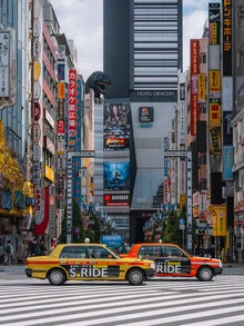 Photo art by Luca Talarico: nighttime street view in Shinjuku, Tokyo with neon lights.