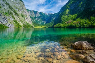 Summer photo art: tranquil scene at Lake Obersee with mountains in the background