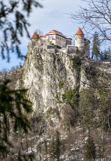 Photo art by Lotte Wildiers: view of Bled Castle with mountains in the background