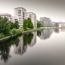 Photo art: tranquil long exposure of a Berlin canal with reflections.