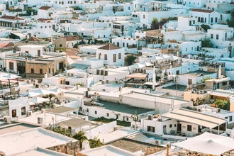 Photo art by Lotte Wildiers: sunset over white houses in Lindos, Greece.