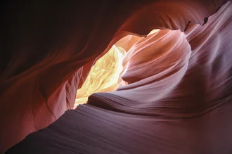Photo art by Dennis Oswald: gentle sand dunes in Lower Antelope Canyon
