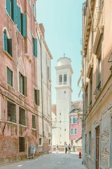 Colorful photo of Venice featuring pastel palaces and calm water