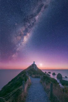 Photo art by Jean Claude Castor: lighthouse under the starry sky of New Zealand.