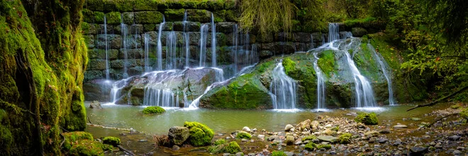Beautiful panorama of a waterfall in the forest by Martin Wasilewski