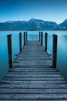 Photo art by Martin Wasilewski: tranquil blue hour at Lake Forggensee with mountains in the background