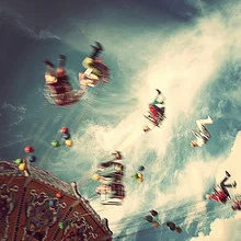 Photo art by Jochen Fischer: colorful carousel ride under a clear sky