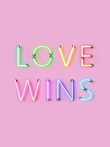 Wall art featuring vibrant rainbow colors with the message 'LOVE WINS'