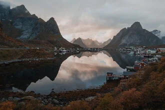 Beautiful sunset over the water in Reine, Norway.